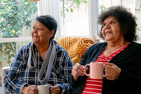 Two first nations ladies having a yarn