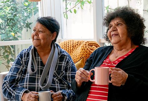 Two first nations ladies having a yarn