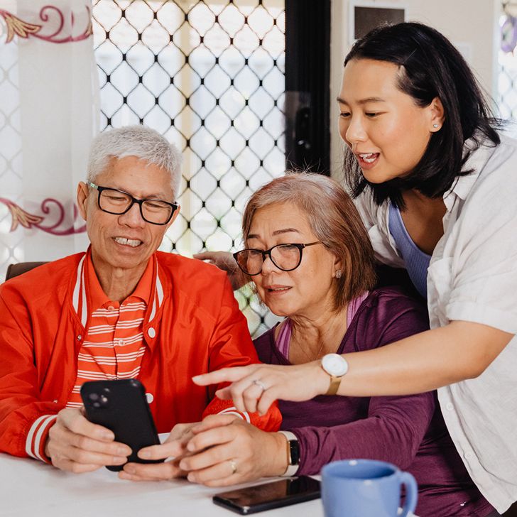 Family group using the new mobile app from iLA