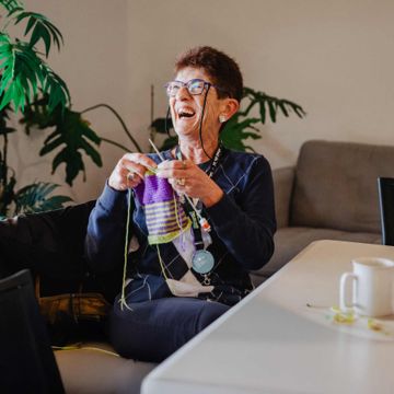 older woman knitting
